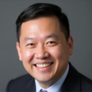 Professional portrait of James Tan, Principal Consultant