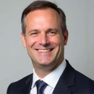 Professional portrait of Michael Doe, Senior Analyst